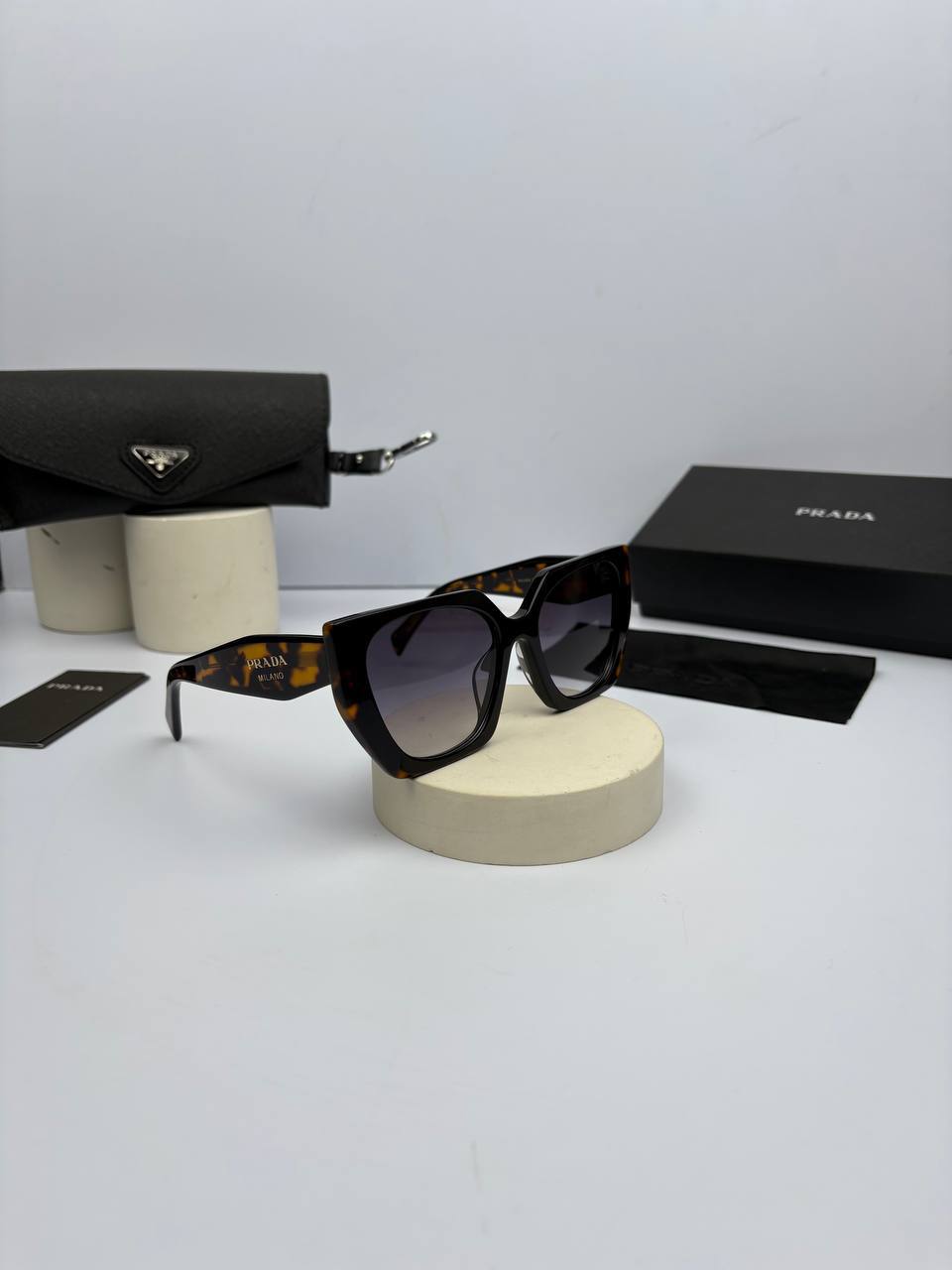 5D8E808C-0AF1-4905-80FD-5CB0C74EA42C_converted prada-15ws ( فریم هاوانا عدسی هایلایت آبی ) - Image 1