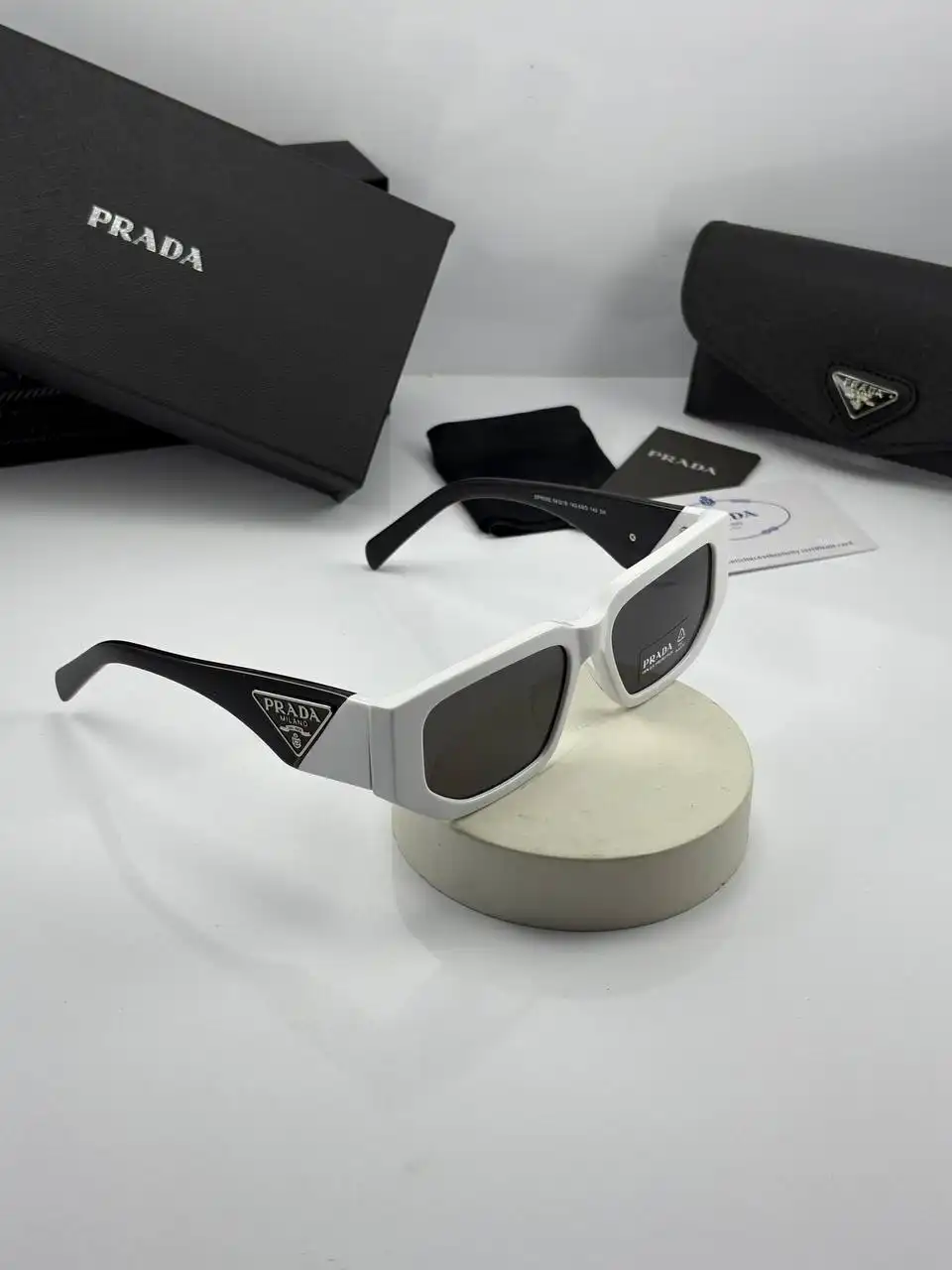 IMG_20250703_214739_611 عینک prada-spr09z سفید مشکی دودی - Image 1