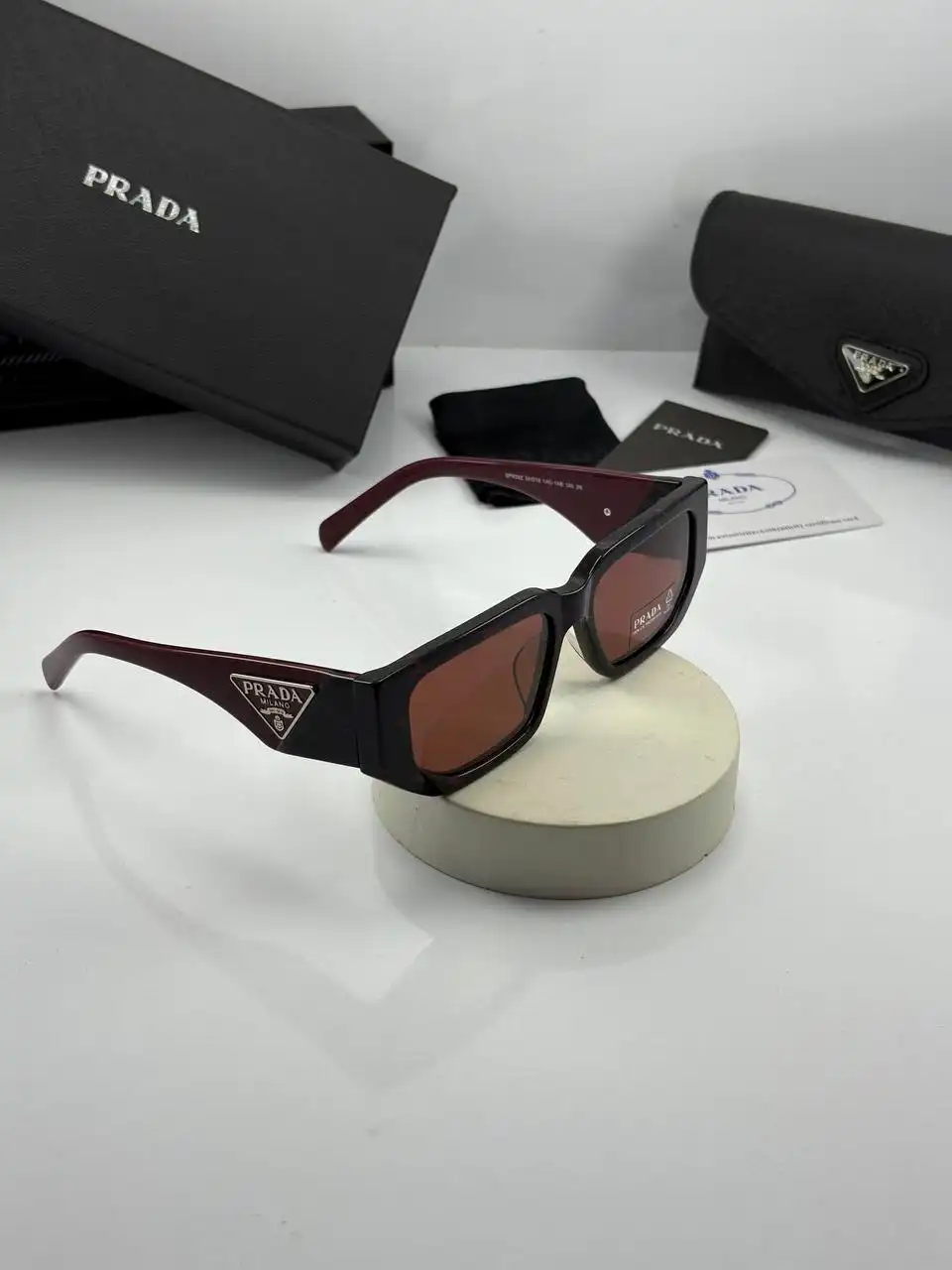 IMG_20250703_222056_068 عینک prada-spr09z ترکیب مشکی زرشکی - Image 1