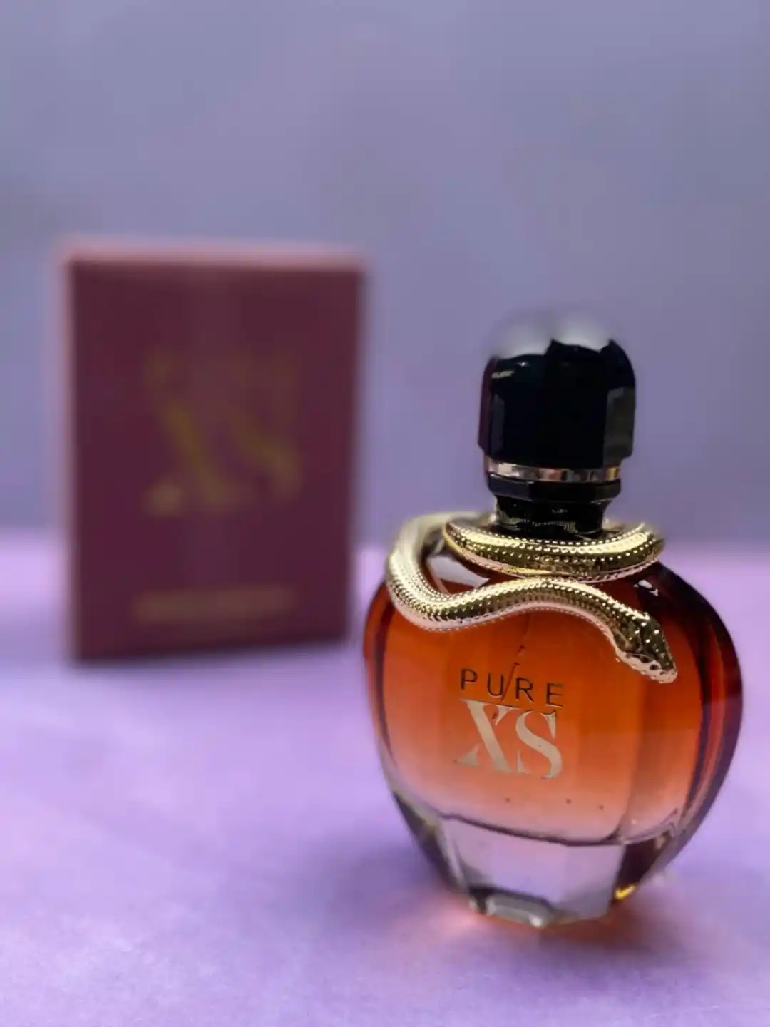 Picsart_25-07-23_03-12-31-907 عطر Pure XS - Image 1