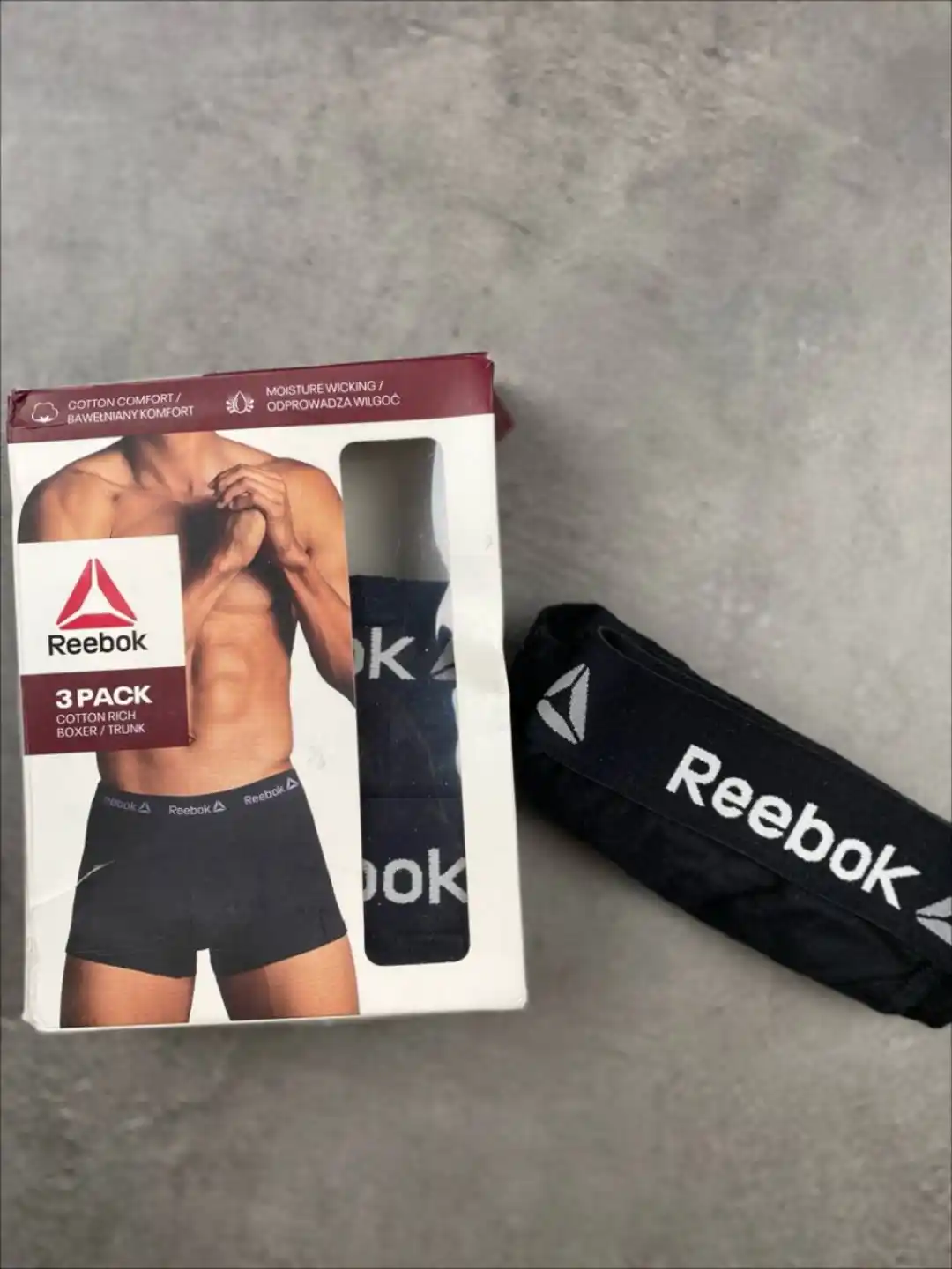 Picsart_25-08-02_03-52-01-155 شورت مردانه Reebok - Image 1