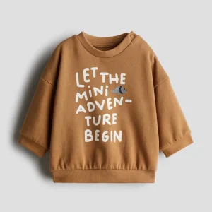 دورس نوزادی کاراملی جلو نوشته H&M