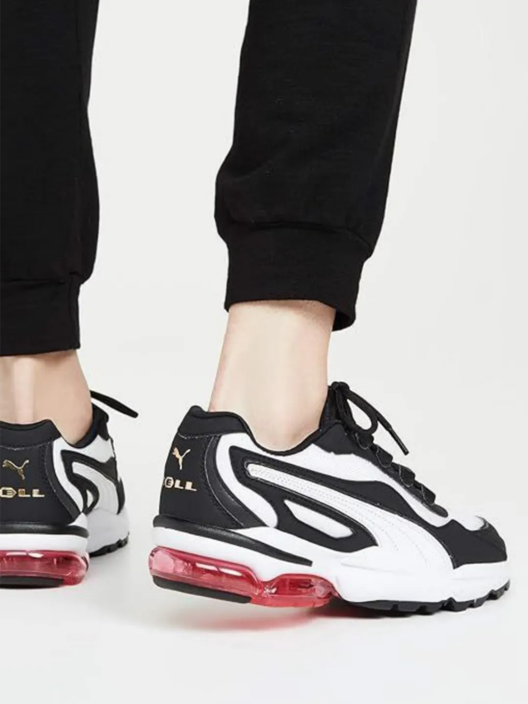 Picsart_25-09-02_18-45-14-509 کتونی پوما مدل PUMA Women's Cell Stellar Sneaker, Black - Image 1