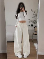 شلوار جین کرمی اسلوچی دمپا گشاد موتل - Image 2