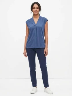 A stylish women's cotton T-shirt in stone blue, featuring a V-neck and pleated details.
